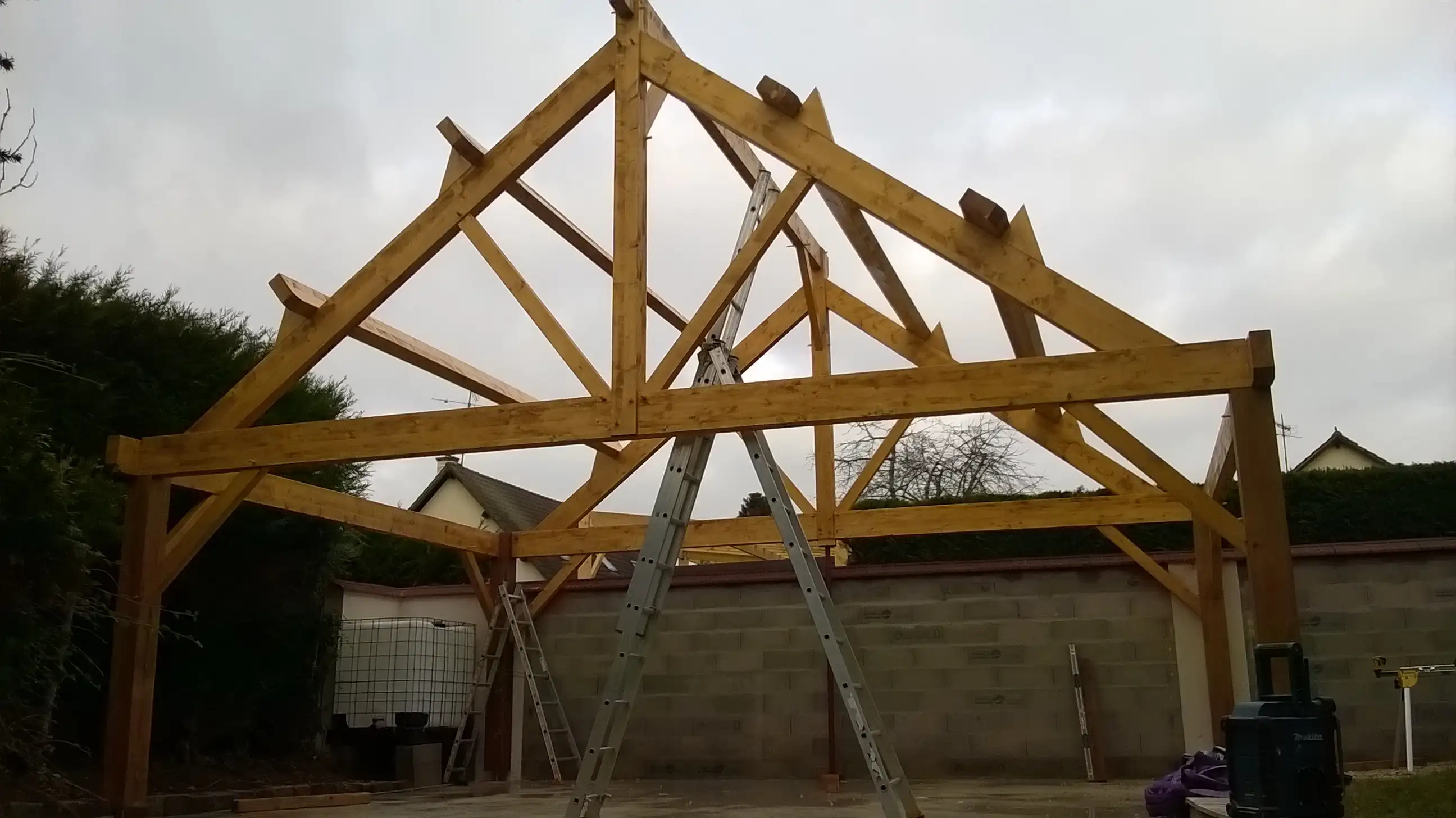 Construction charpente abri voiture Houdan