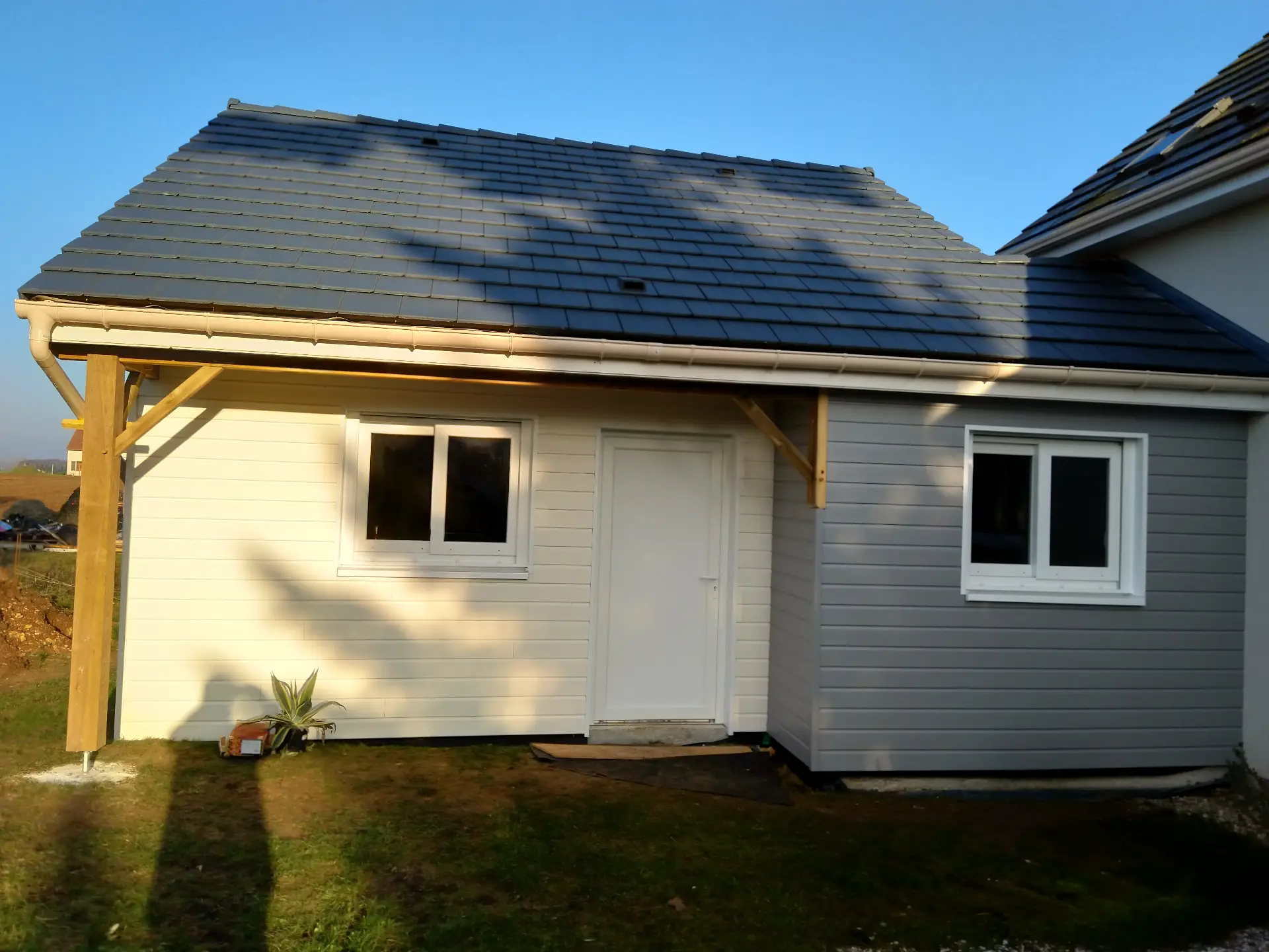 Extension maison bardage mixte gris blanc ossature bois Eure-et-Loir