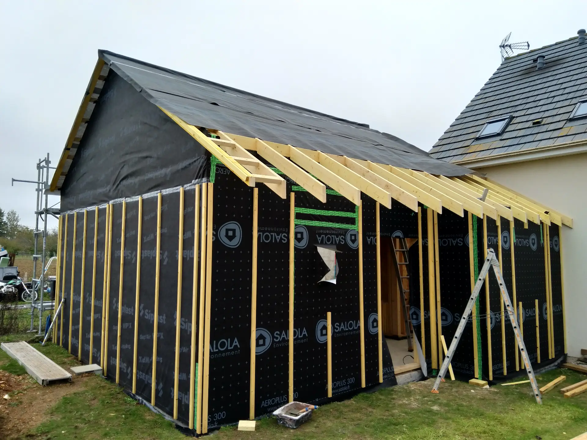 Montage mur ossature bois pare-pluie construction Dreux