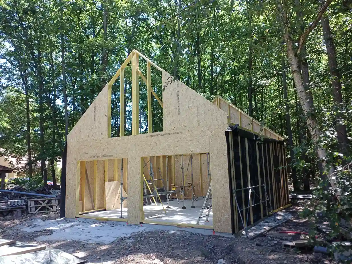 Montage structure garage charpentier professionnel