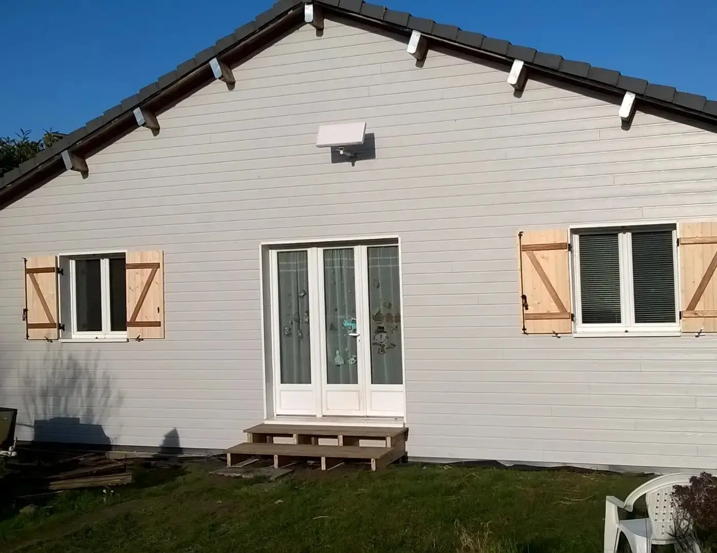 Maison bardage bois gris construction ossature bois Dreux